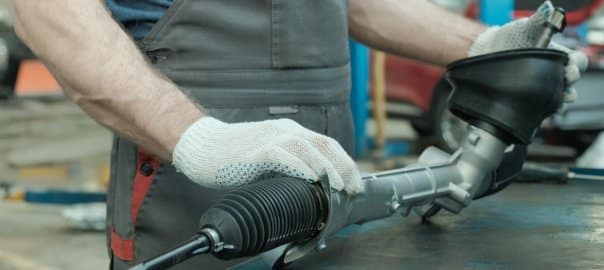 Close-up of a power steering rack and pinion unit being repaired in Christchurch